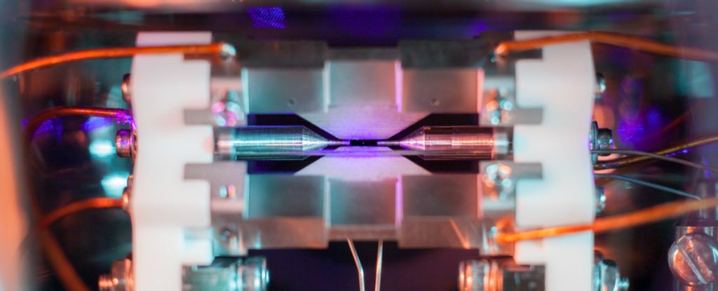 A single, positively-charged strontium atom, suspended in motion by electric fields.